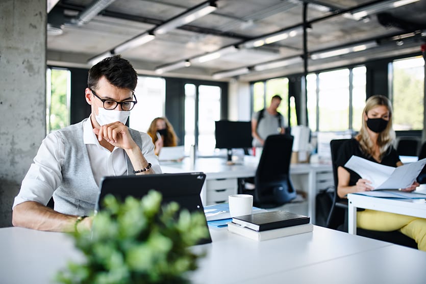 A person taking Financial advices from a Financial Wellness article