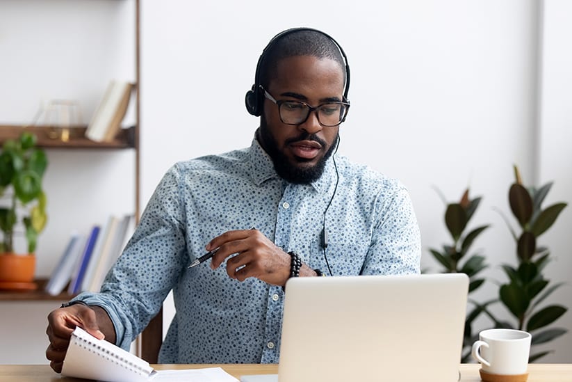 Guy watching financial videos from Consolidated Resources