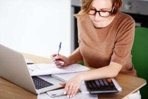 woman reviewing her debt consolidation options