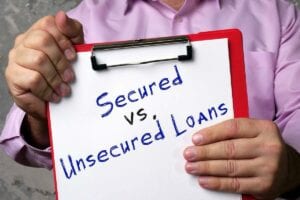 clipboard showing difference between secured and unsecured debt