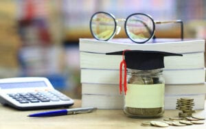 college savings jar and calculator